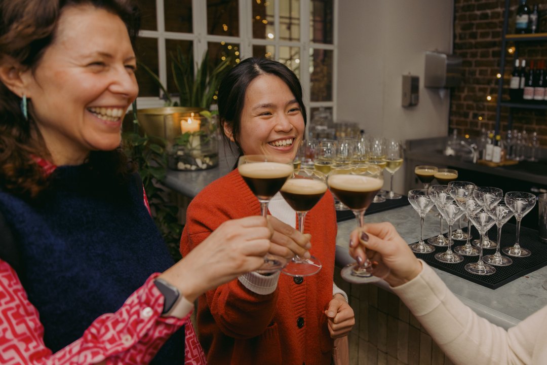 Guests toasting with espresso martinis