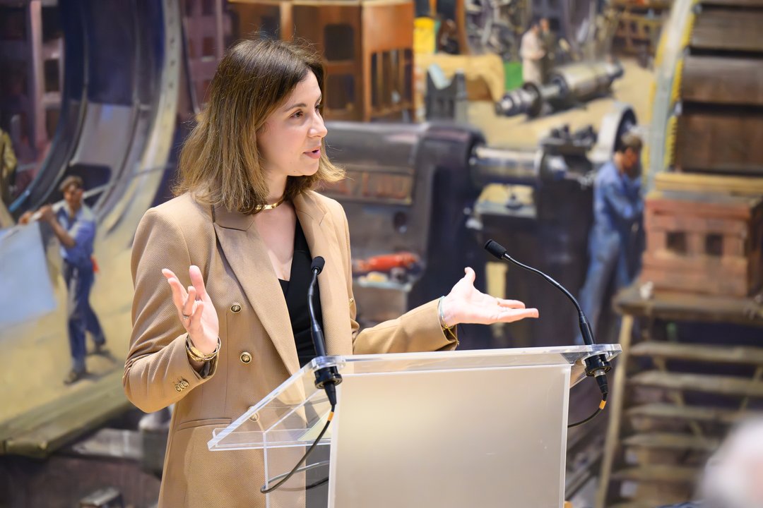 A speaker at the podium at The Science of Coffee