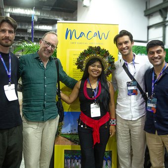 The Macaw team with Celeste Suruí at the branded stand, Rio Innovation Week