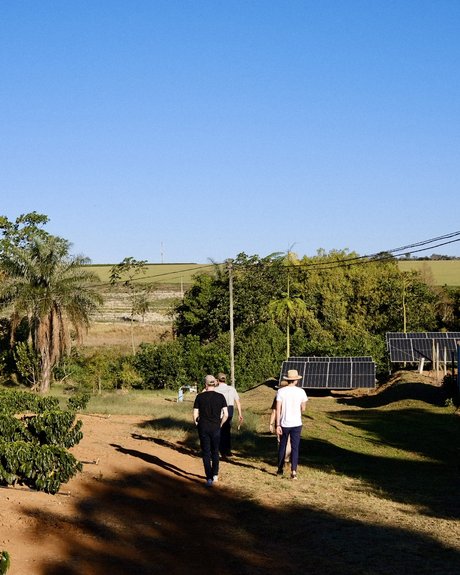 Walking toward the reservoir and solar panels